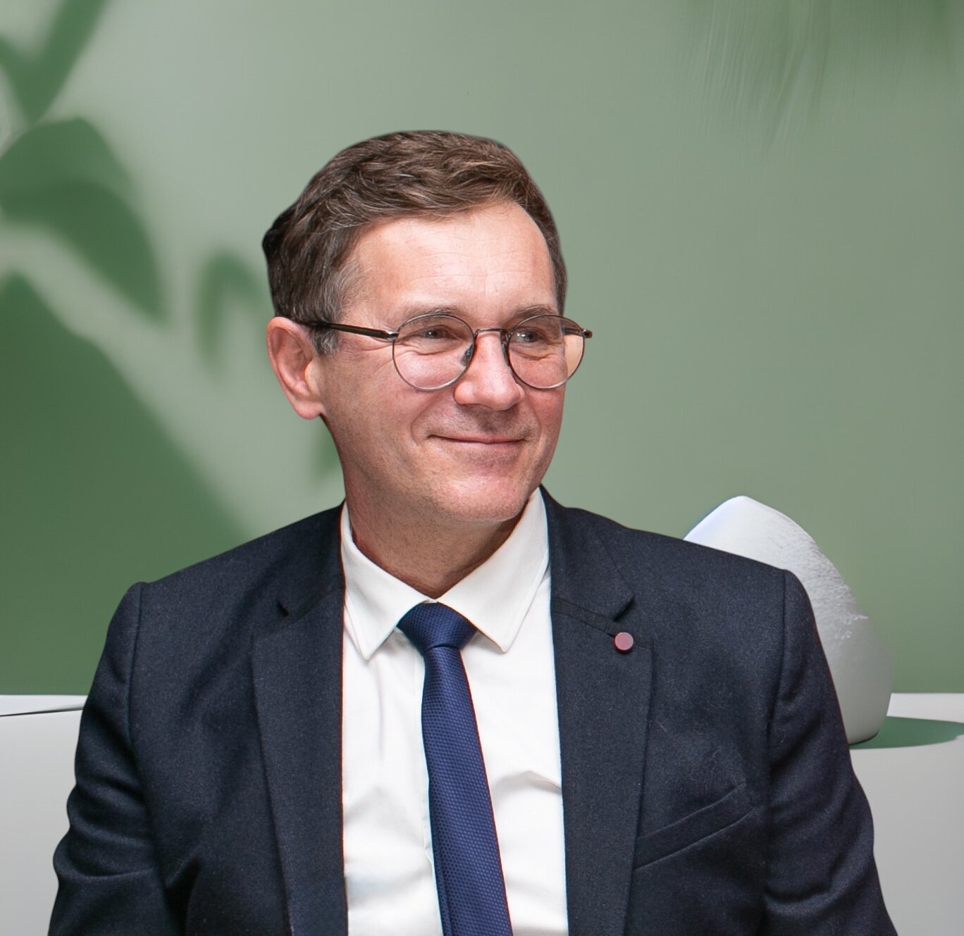 Portrait of Alar Võrk, Sales Architect, in a navy suit